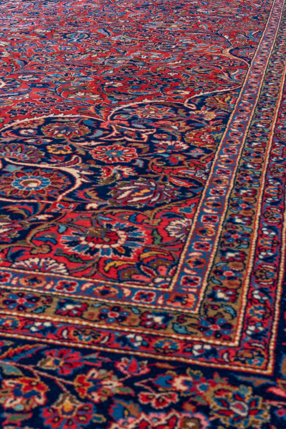 10' x 16' one-of-a-kind handmade vintage Kashan rug. Color palette: red, navy, ivory, rose, burgundy, slate, camel, blue