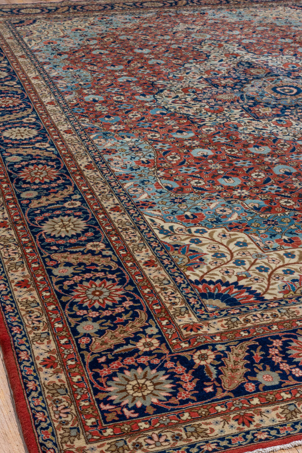 10' x 13' one-of-a-kind handmade vintage Tabriz oversize rug. Color palette: rust, navy, ivory, sky blue, cream, slate blue