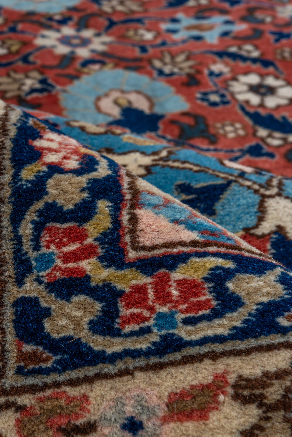 10' x 13' one-of-a-kind handmade vintage Tabriz oversize rug. Color palette: rust, navy, ivory, sky blue, cream, slate blue