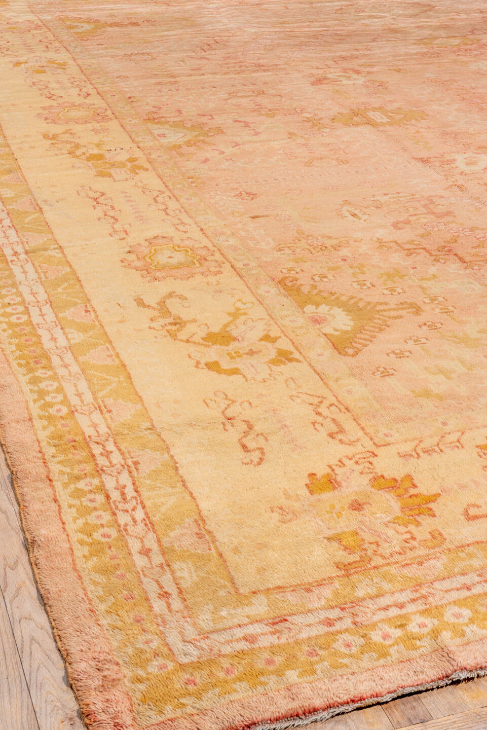 14' x 17' one-of-a-kind handmade vintage Oushak oversize rug. Color palette: blush, ivory, pale gold, rose, peach, camel