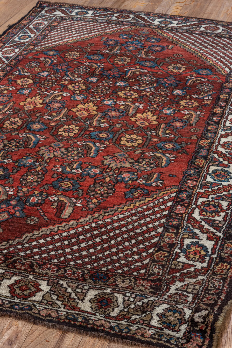 4' x 6' one-of-a-kind handmade vintage Kurd small size rug. Color palette: red, ivory, indigo, rust, navy, camel, burgundy