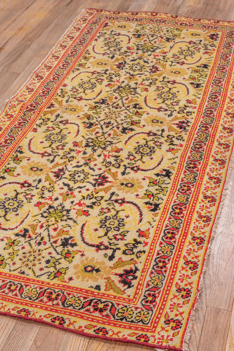 2' x 6' one-of-a-kind handmade vintage Agra runner rug. Color palette: ivory, rust, gold, olive, burgundy, camel, charcoal