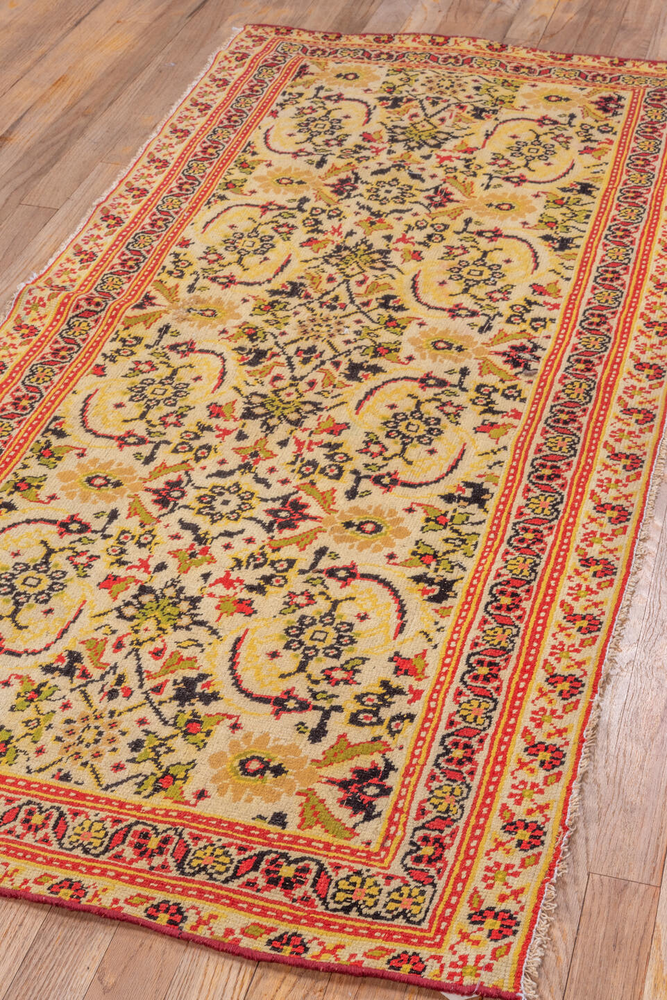 2' x 6' one-of-a-kind handmade vintage Agra runner rug. Color palette: ivory, rust, gold, olive, burgundy, camel, charcoal