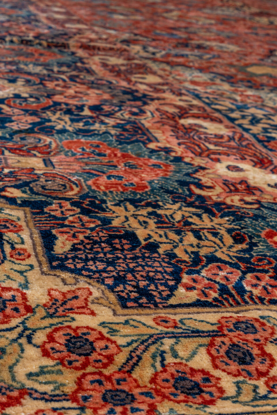 10' x 17' one-of-a-kind handmade vintage Sarouk rug. Color palette: red, navy, ivory, sky blue, rust, coral, camel, blue
