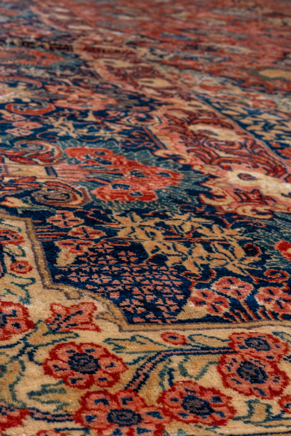 10' x 17' one-of-a-kind handmade vintage Sarouk rug. Color palette: red, navy, ivory, sky blue, rust, coral, camel, blue