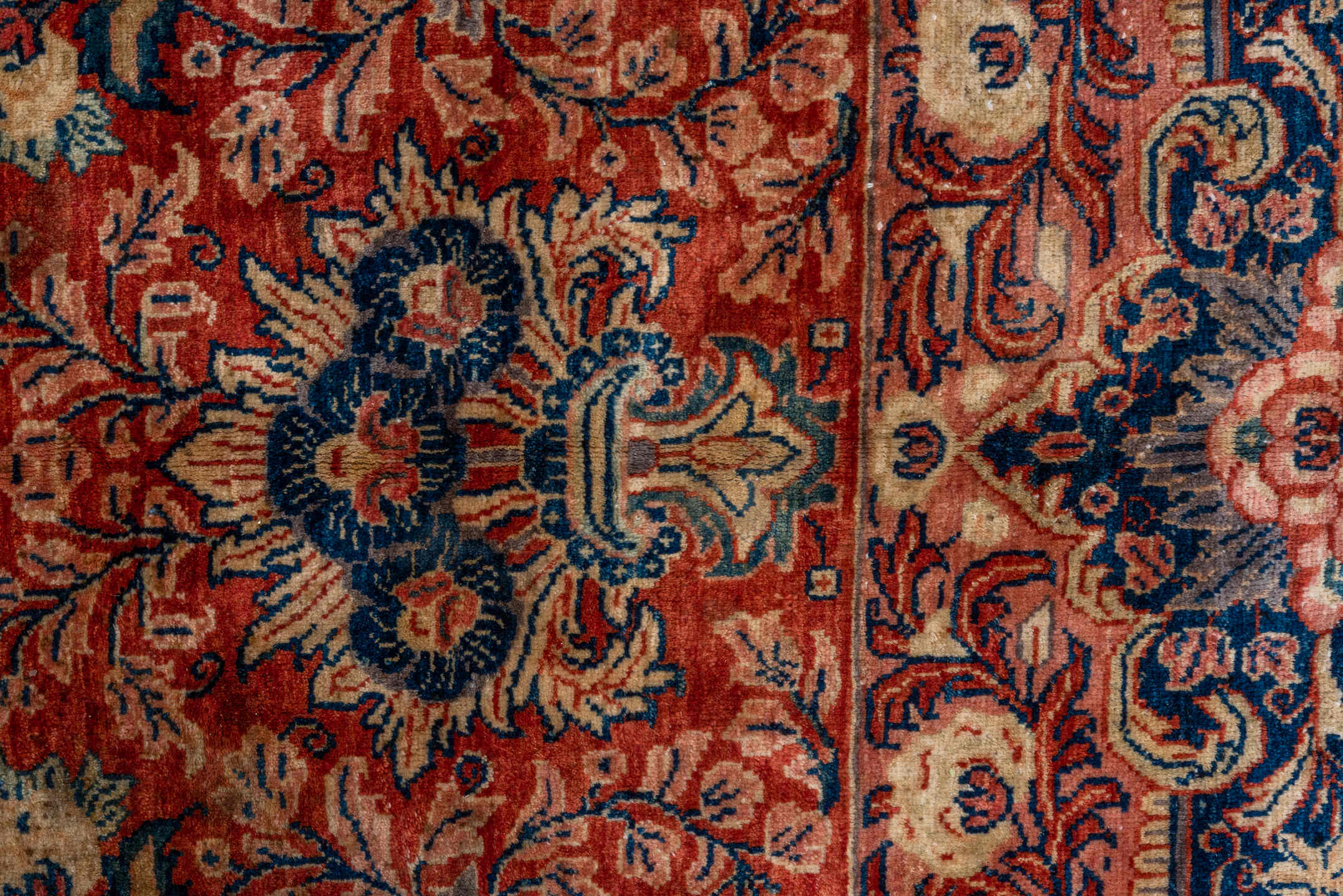 10' x 17' one-of-a-kind handmade vintage Sarouk rug. Color palette: red, navy, ivory, sky blue, rust, coral, camel, blue