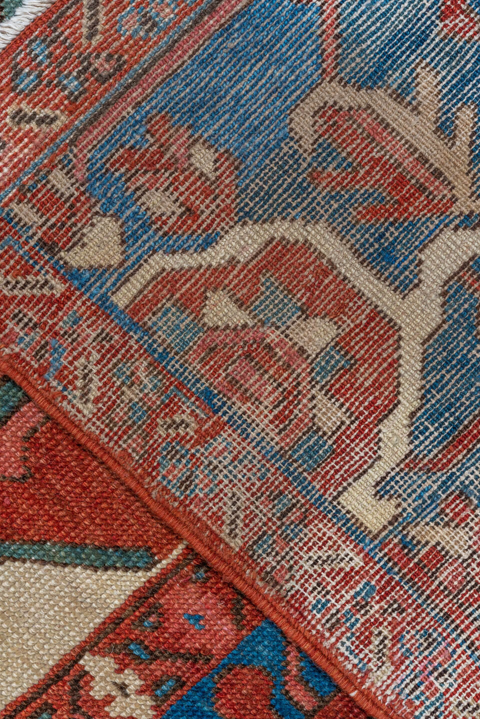 10' x 15' one-of-a-kind handmade vintage Serapi rug. Color palette: rust, sky blue, ivory, crimson, slate, rose, navy