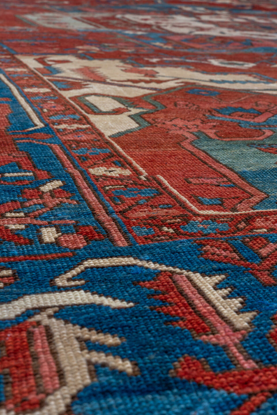 10' x 15' one-of-a-kind handmade vintage Serapi rug. Color palette: rust, sky blue, ivory, crimson, slate, rose, navy