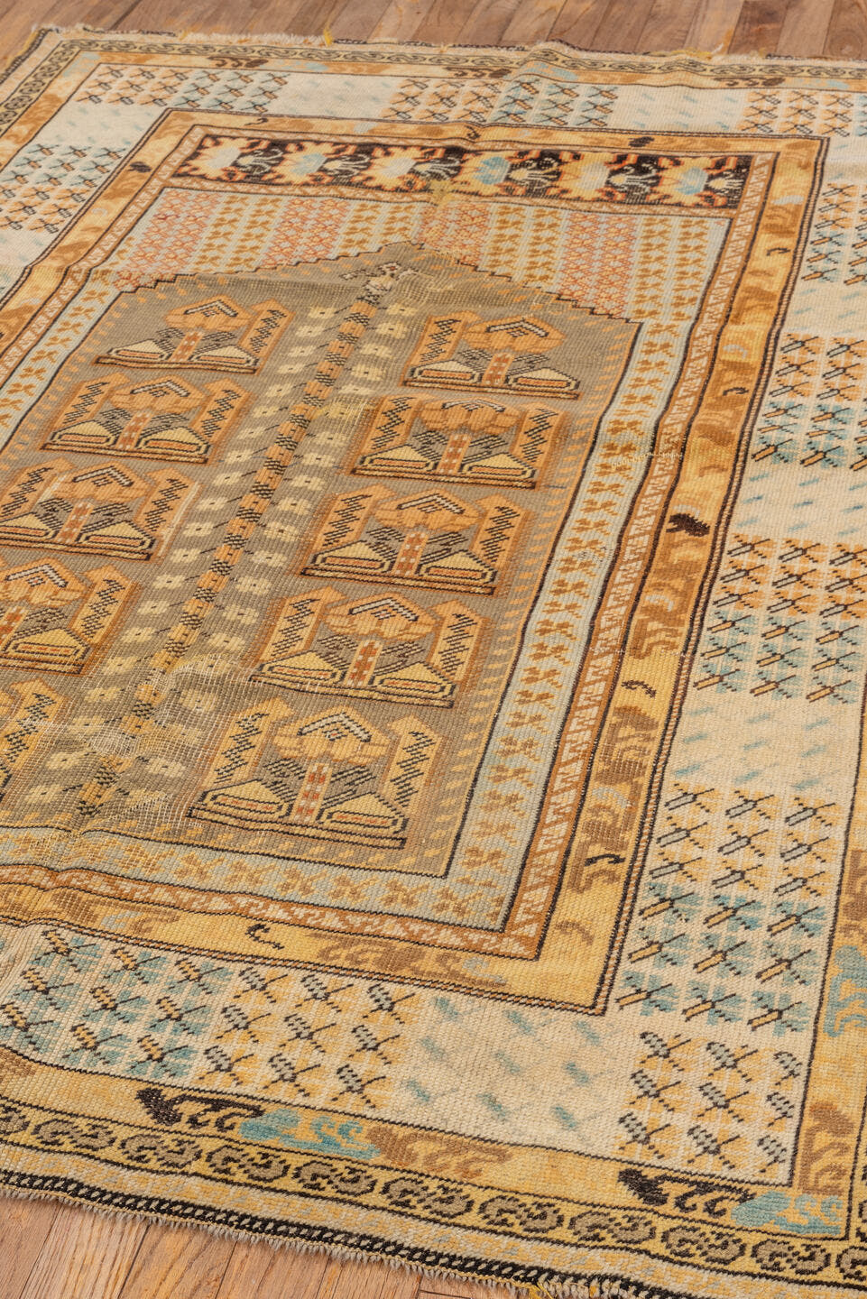 4' x 5' one-of-a-kind handmade vintage Kula small size rug. Color palette: ivory, camel, taupe, pale blue, tan, charcoal