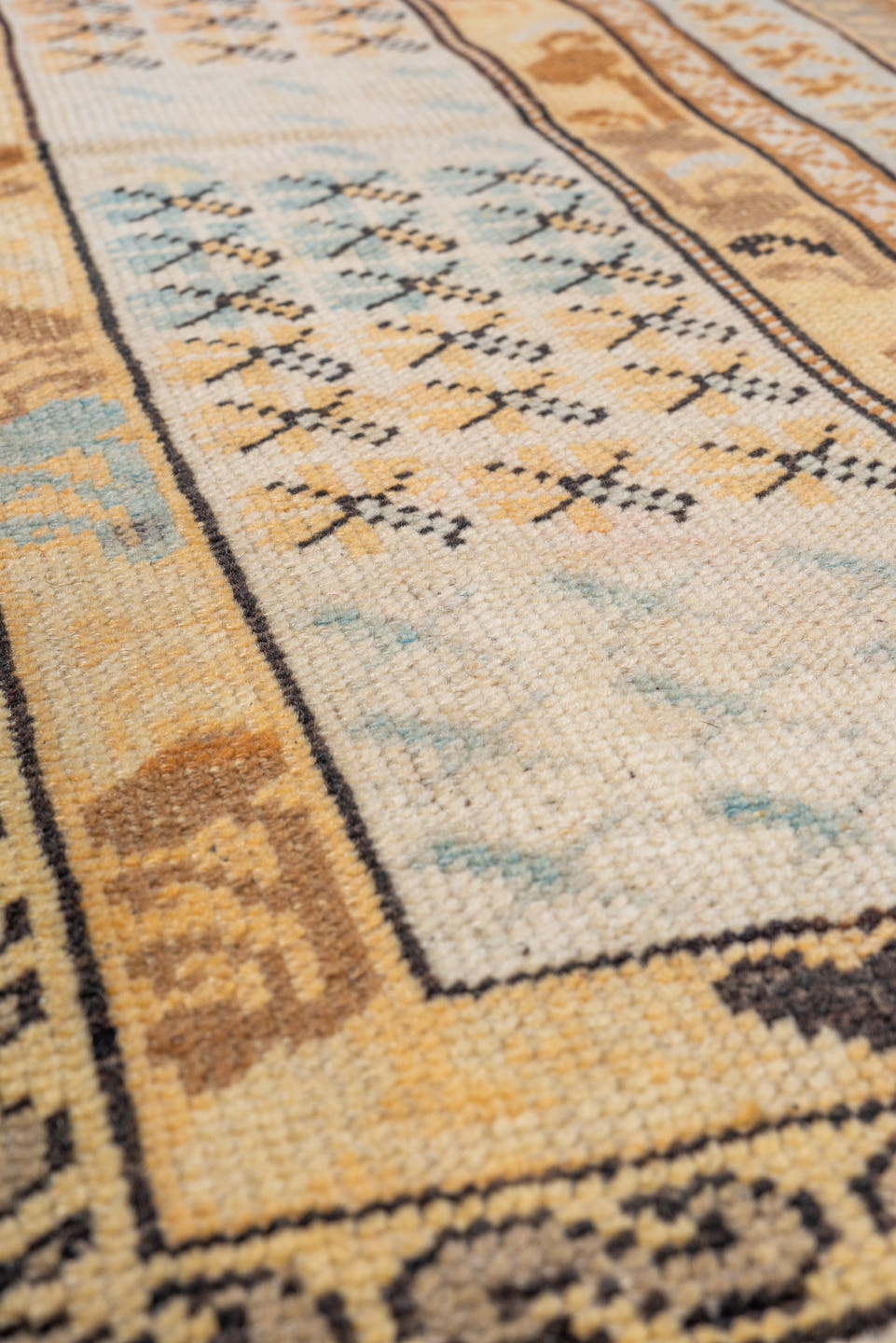 4' x 5' one-of-a-kind handmade vintage Kula small size rug. Color palette: ivory, camel, taupe, pale blue, tan, charcoal