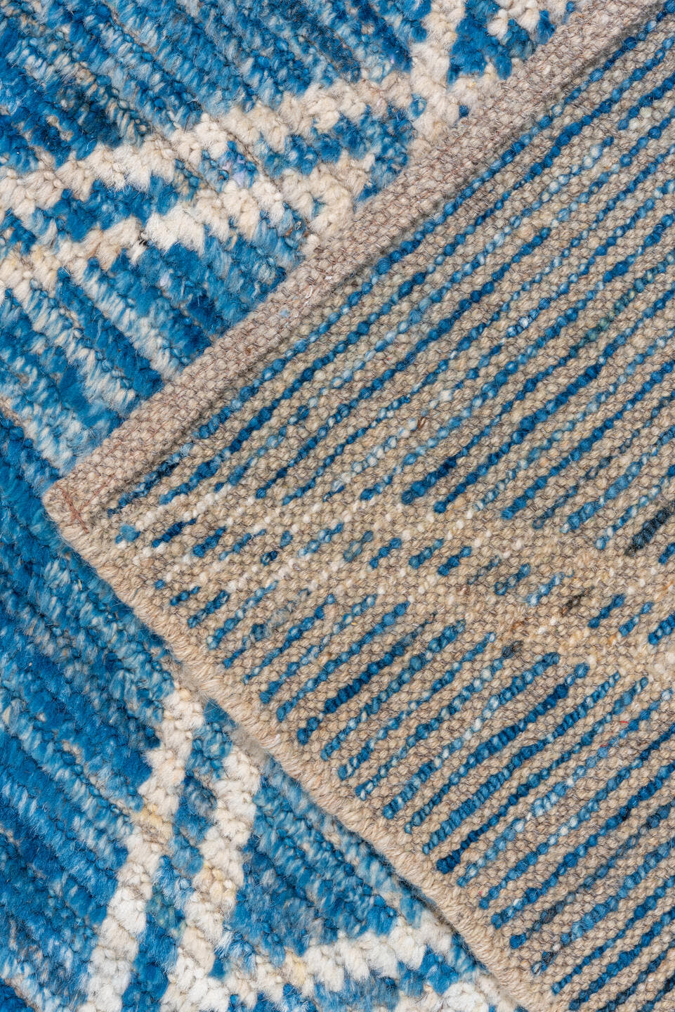 9' x 12' one-of-a-kind handmade vintage Tulu large size rug. Color palette: blue, ivory, sky blue, light blue