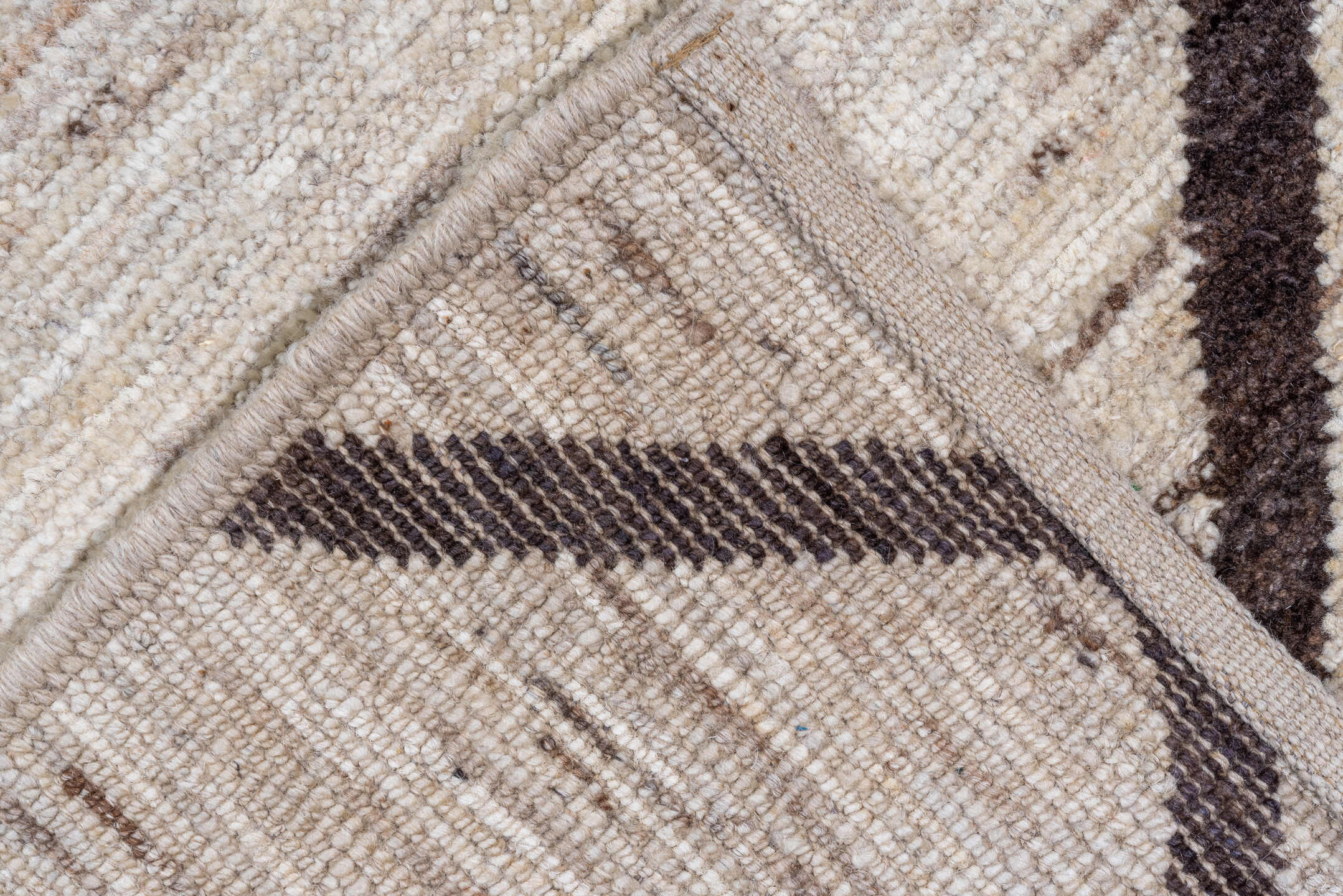 8' x 9' one-of-a-kind handmade vintage Tulu rug. Color palette: ivory, brown, taupe, charcoal, beige, gray, black