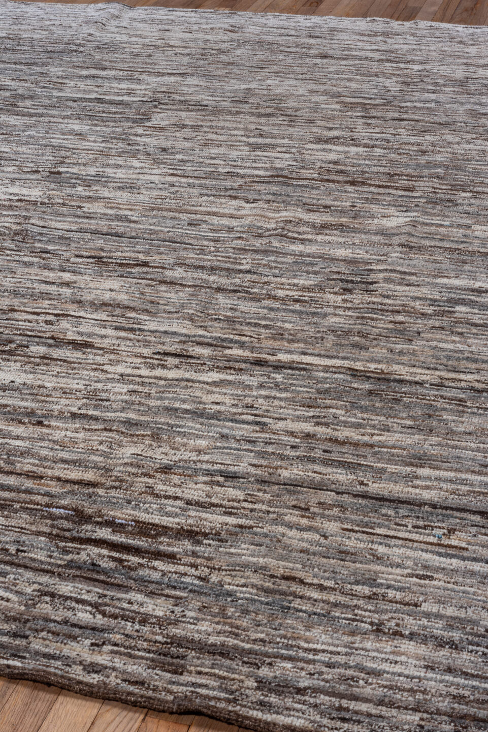 8' x 9' one-of-a-kind handmade vintage Tulu rug. Color palette: black, brown, charcoal, dim gray, gray, light gray