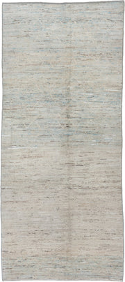 5' x 11' one-of-a-kind handmade vintage Tulu runner rug. Color palette: ivory, pale blue, taupe, gray, cream, light blue