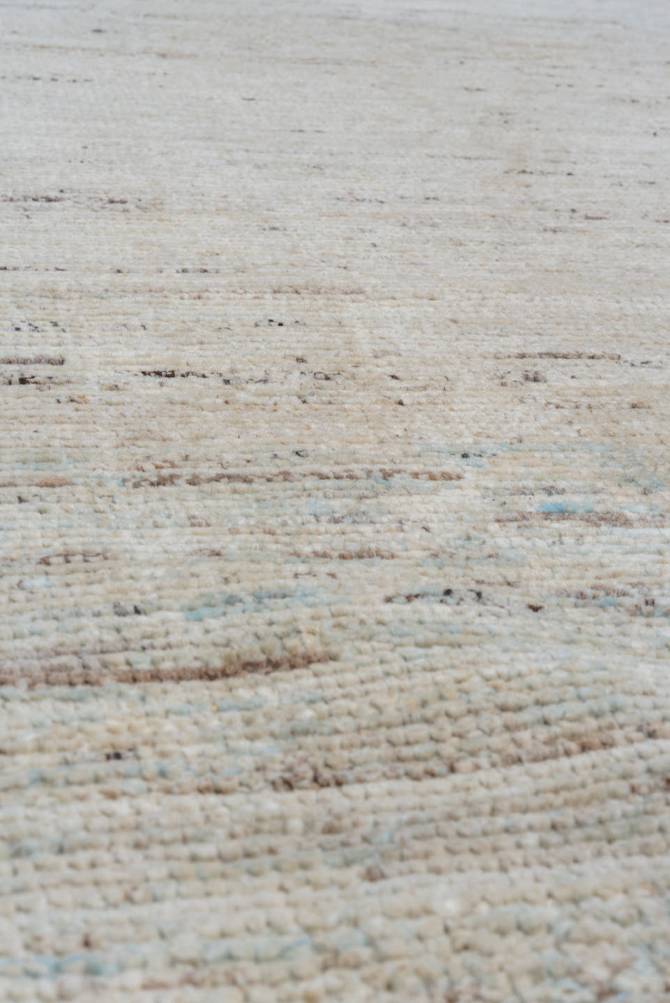 5' x 11' one-of-a-kind handmade vintage Tulu runner rug. Color palette: ivory, pale blue, taupe, gray, cream, light blue
