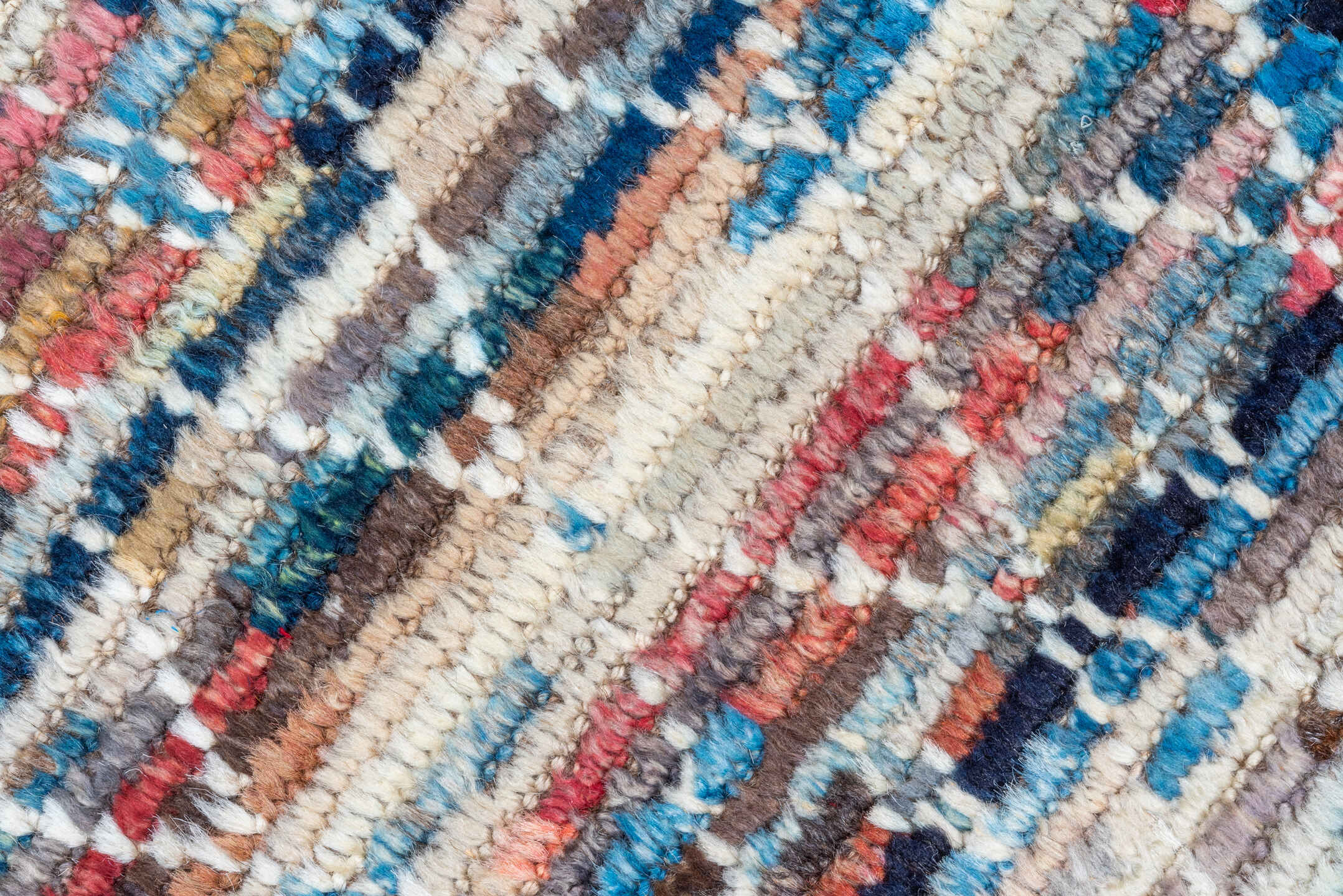 8' x 9' one-of-a-kind handmade vintage Tulu rug. Color palette: ivory, taupe, blue, rust, coral, brown, charcoal, beige