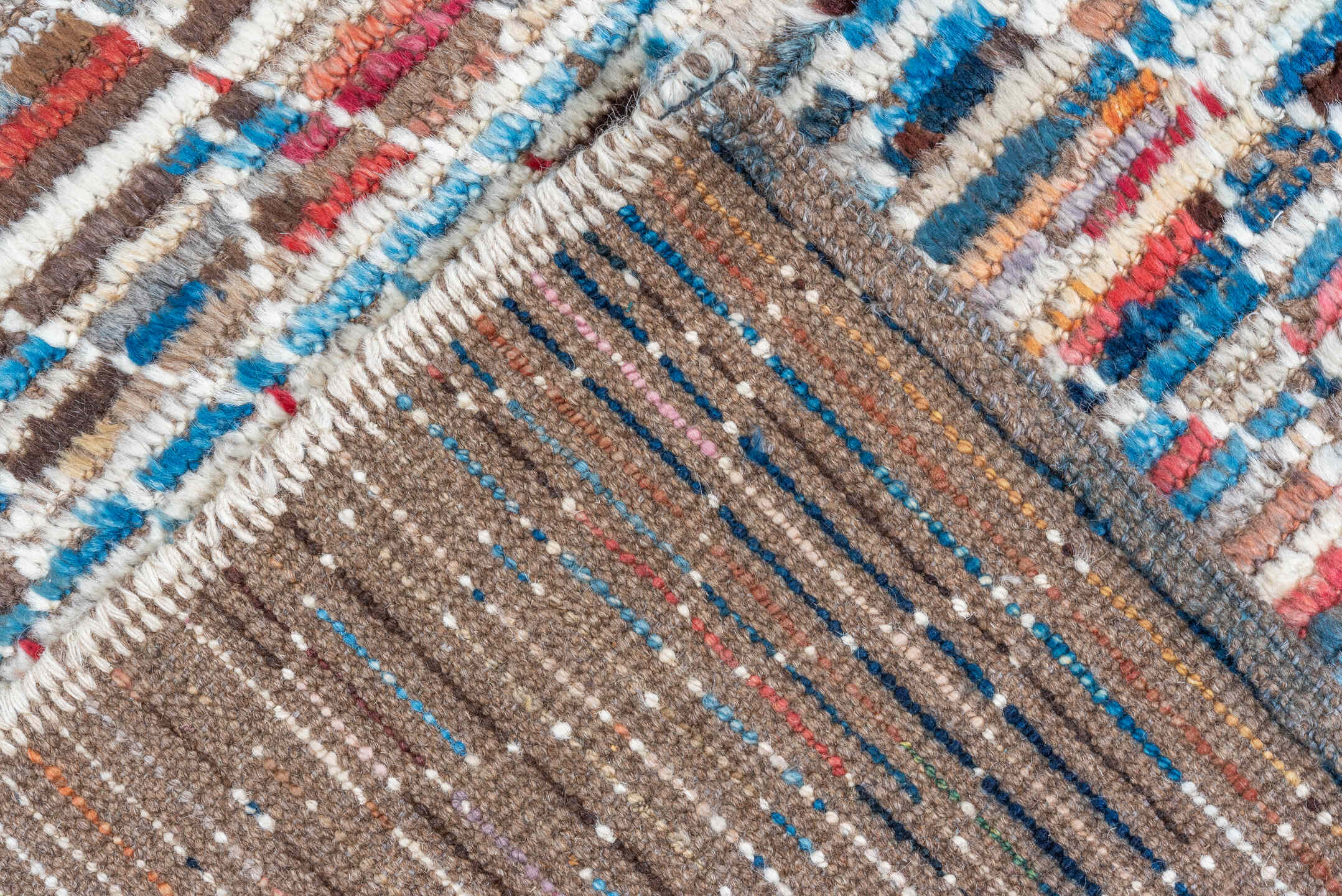 8' x 9' one-of-a-kind handmade vintage Tulu rug. Color palette: ivory, taupe, blue, rust, coral, brown, charcoal, beige
