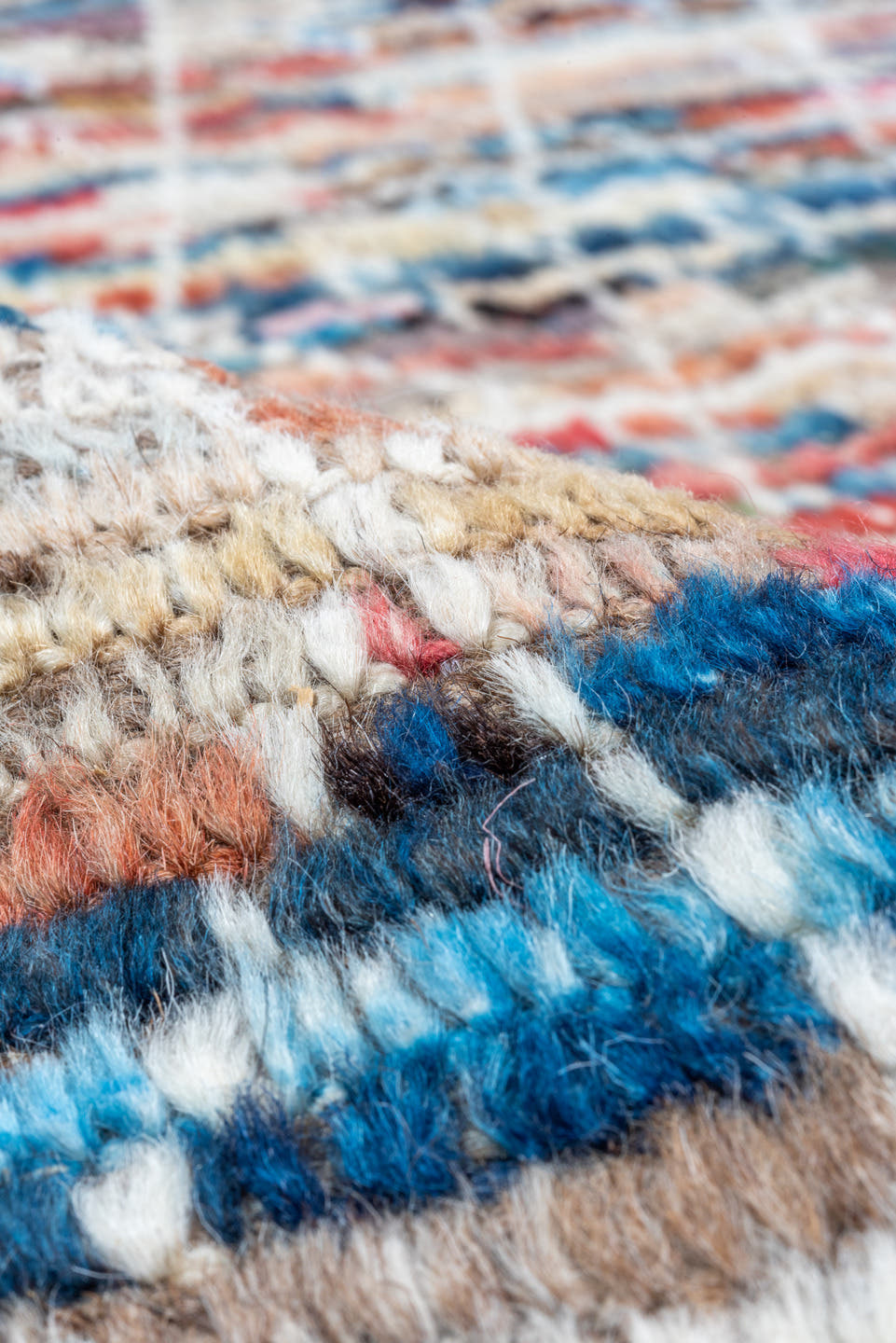 8' x 9' one-of-a-kind handmade vintage Tulu rug. Color palette: ivory, taupe, blue, rust, coral, brown, charcoal, beige