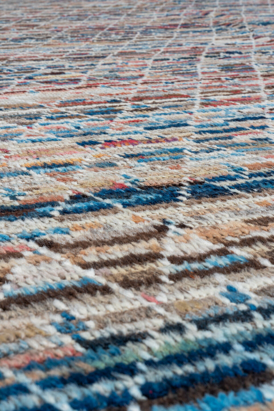 8' x 9' one-of-a-kind handmade vintage Tulu rug. Color palette: ivory, taupe, blue, rust, coral, brown, charcoal, beige
