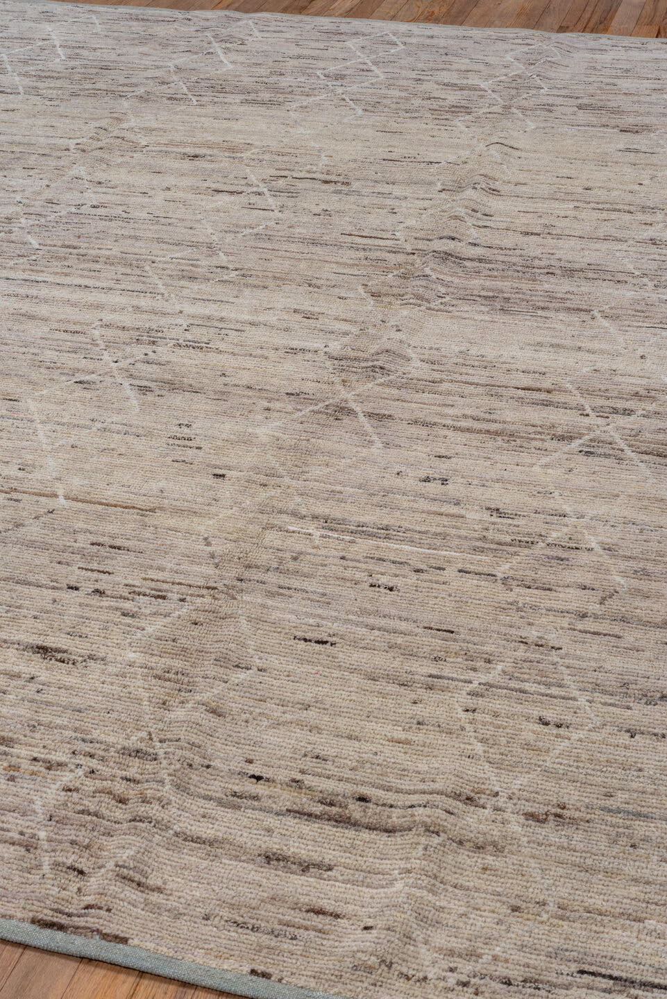 7' x 9' one-of-a-kind handmade vintage Tulu rug. Color palette: ivory, taupe, beige, brown, cream, gray