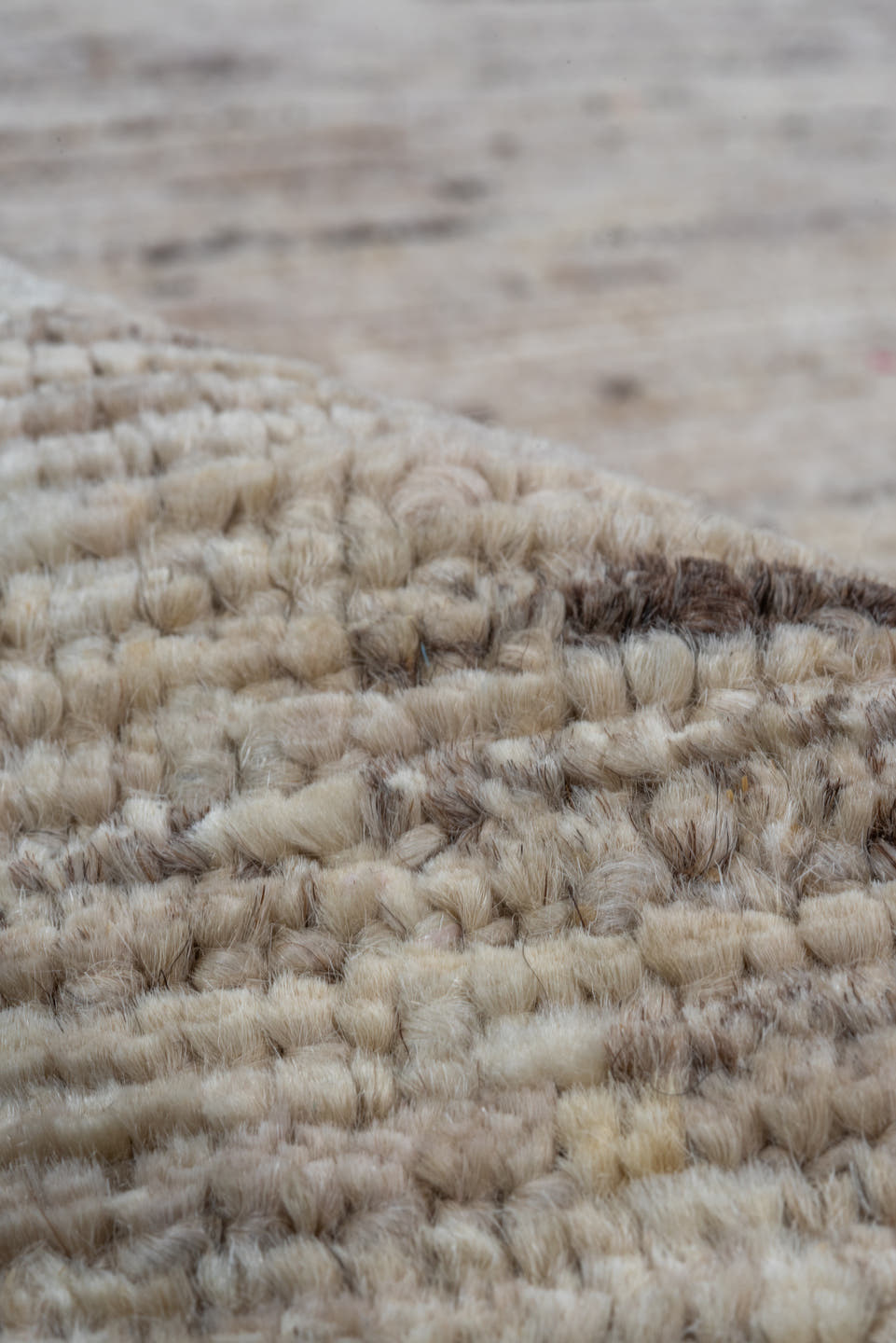 7' x 9' one-of-a-kind handmade vintage Tulu rug. Color palette: ivory, taupe, beige, brown, cream, gray