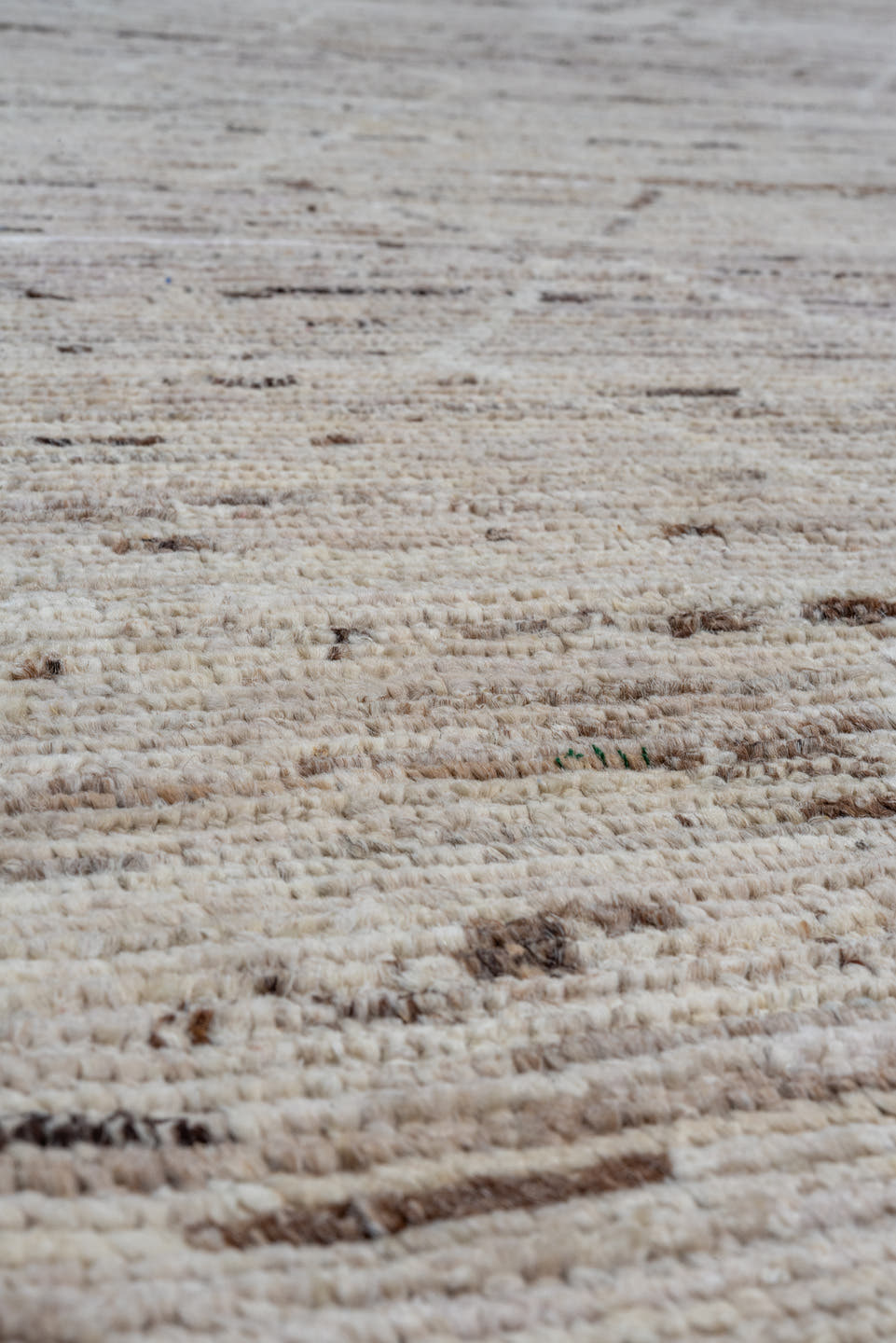 7' x 9' one-of-a-kind handmade vintage Tulu rug. Color palette: ivory, taupe, beige, brown, cream, gray