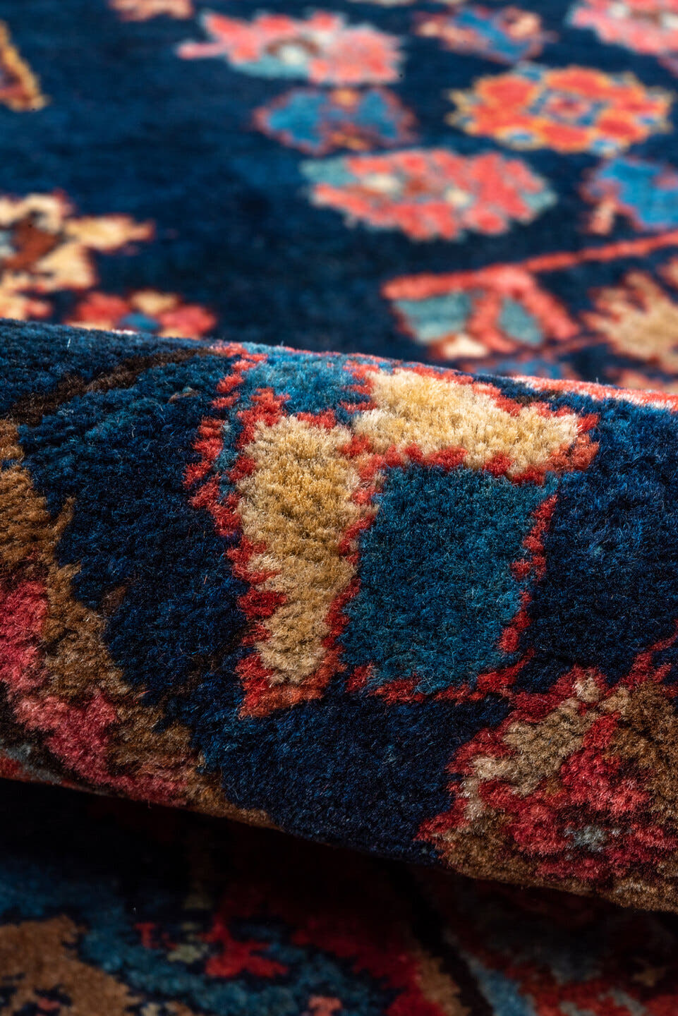 6' x 9' one-of-a-kind handmade vintage Bidjar medium size rug. Color palette: navy, rust, crimson, ivory, cobalt, rose