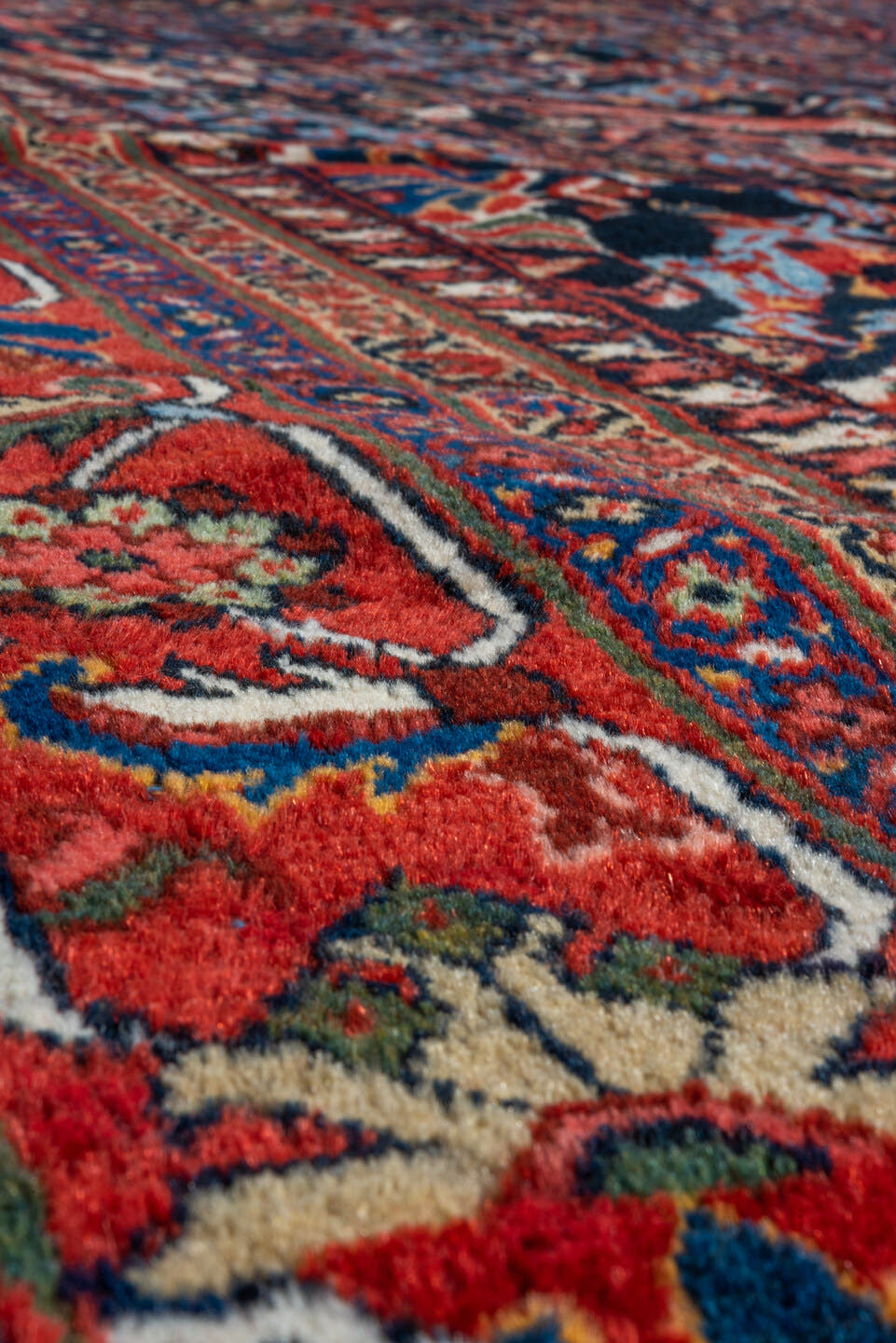 12' x 17' one-of-a-kind handmade vintage Mahal oversize rug. Color palette: navy, rust, crimson, ivory, cobalt, charcoal