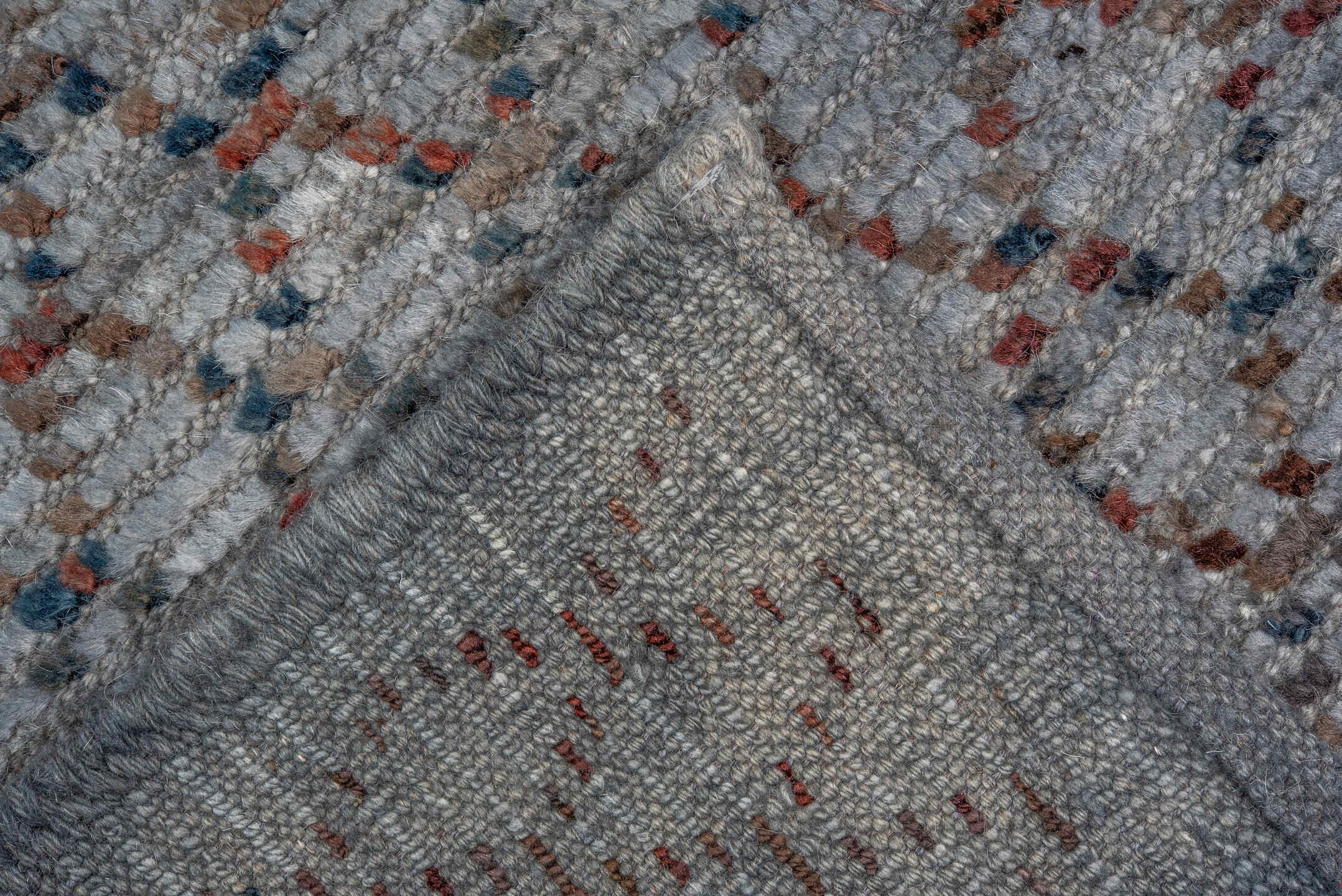 8' x 9' one-of-a-kind handmade vintage Tulu rug. Color palette: blue-gray, slate, rust, charcoal, taupe, gray, blue