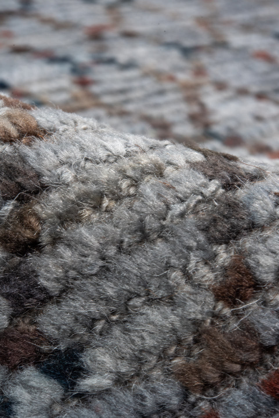 8' x 9' one-of-a-kind handmade vintage Tulu rug. Color palette: blue-gray, slate, rust, charcoal, taupe, gray, blue