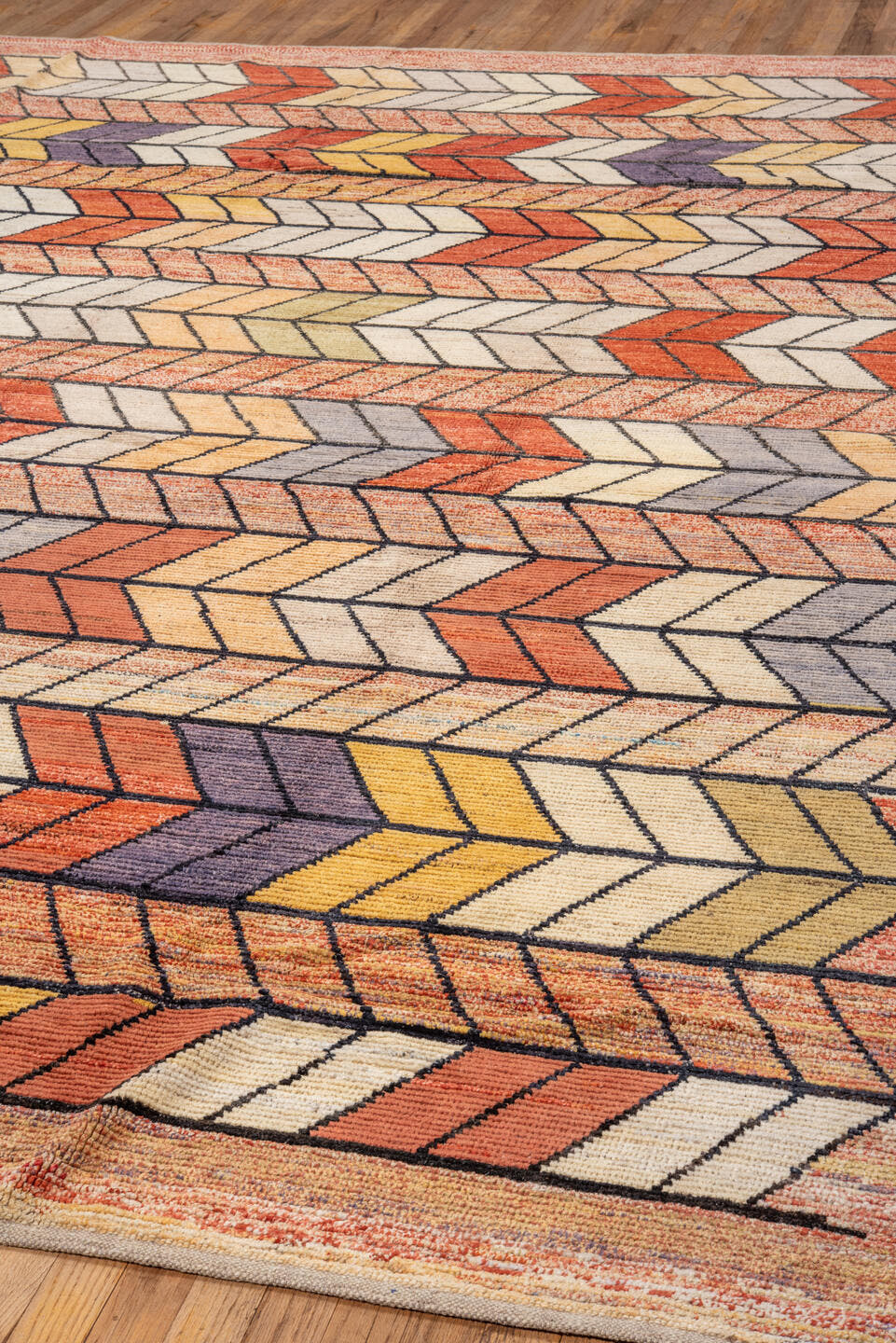 9' x 12' one-of-a-kind handmade vintage Tulu large size rug. Color palette: terra cotta, ivory, rust, peach, gold, violet