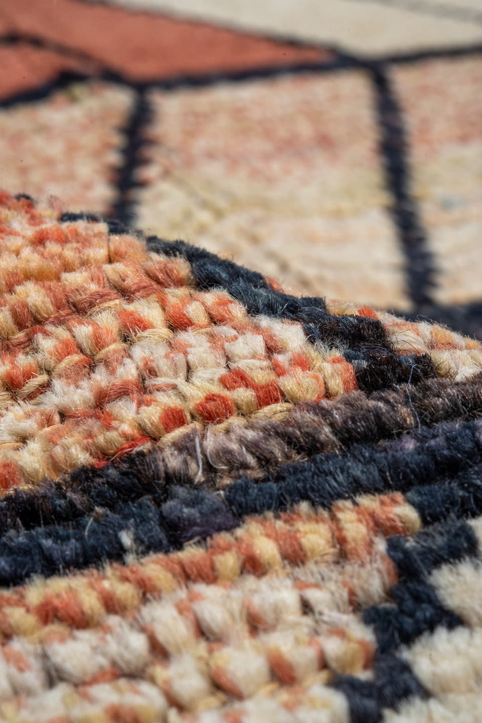 9' x 12' one-of-a-kind handmade vintage Tulu large size rug. Color palette: terra cotta, ivory, rust, peach, gold, violet