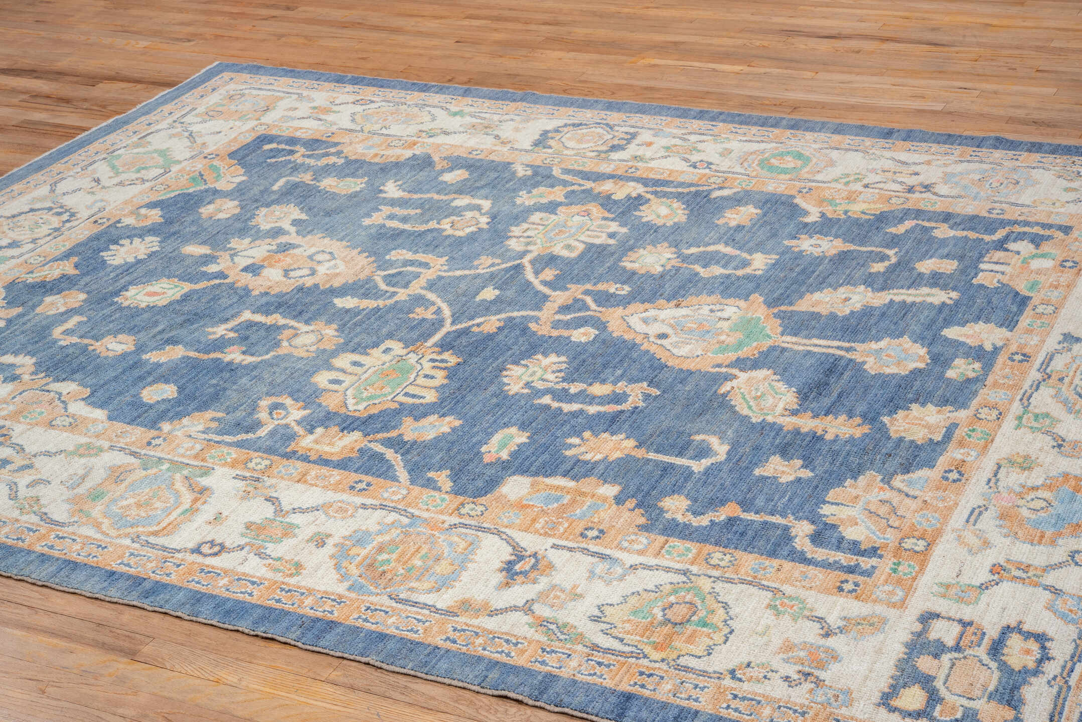 7' x 10' one-of-a-kind handmade vintage Oushak large size rug. Color palette: blue, ivory, peach, mint, tan, terracotta