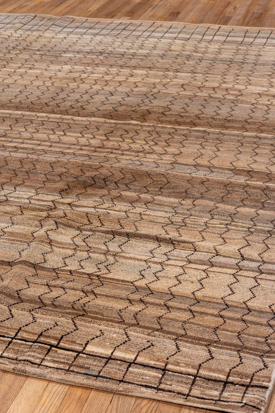 8' x 9' one-of-a-kind handmade vintage Tulu rug. Color palette: black, brown, gray, off-white, orange, pink, snow, white