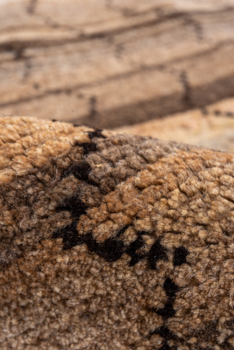 8' x 9' one-of-a-kind handmade vintage Tulu rug. Color palette: black, brown, gray, off-white, orange, pink, snow, white