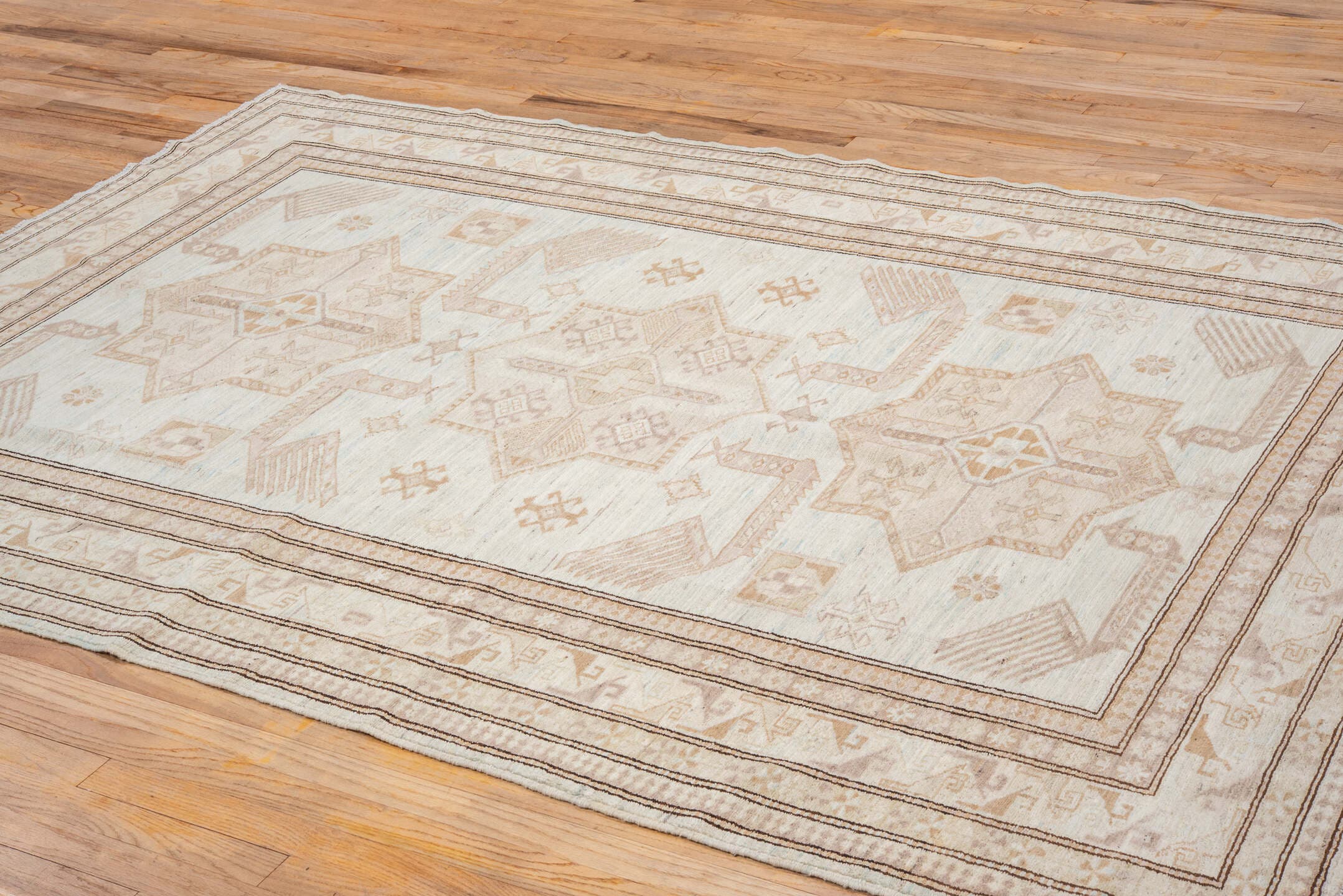 5' x 8' one-of-a-kind handmade vintage Sivas medium size rug. Color palette: ivory, beige, taupe, camel, pale blue, sand