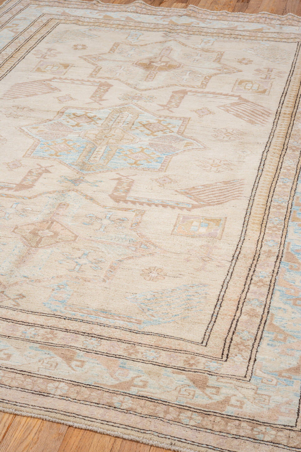 6' x 8' one-of-a-kind handmade vintage Sivas medium size rug. Color palette: ivory, beige, sky blue, taupe, camel, brown