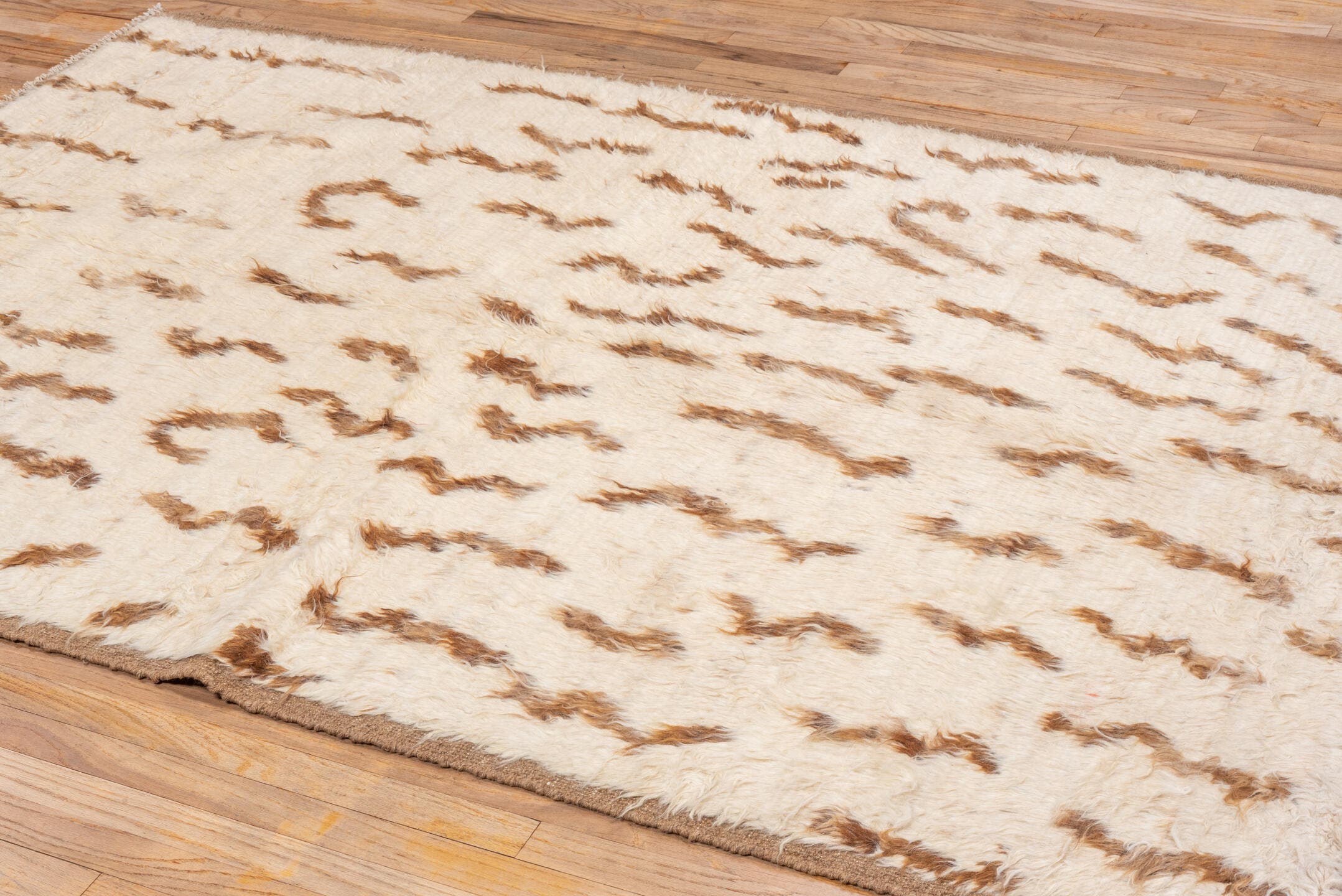 5' x 8' one-of-a-kind handmade vintage Moroccan medium size rug. Color palette: ivory, camel, brown, cream, beige