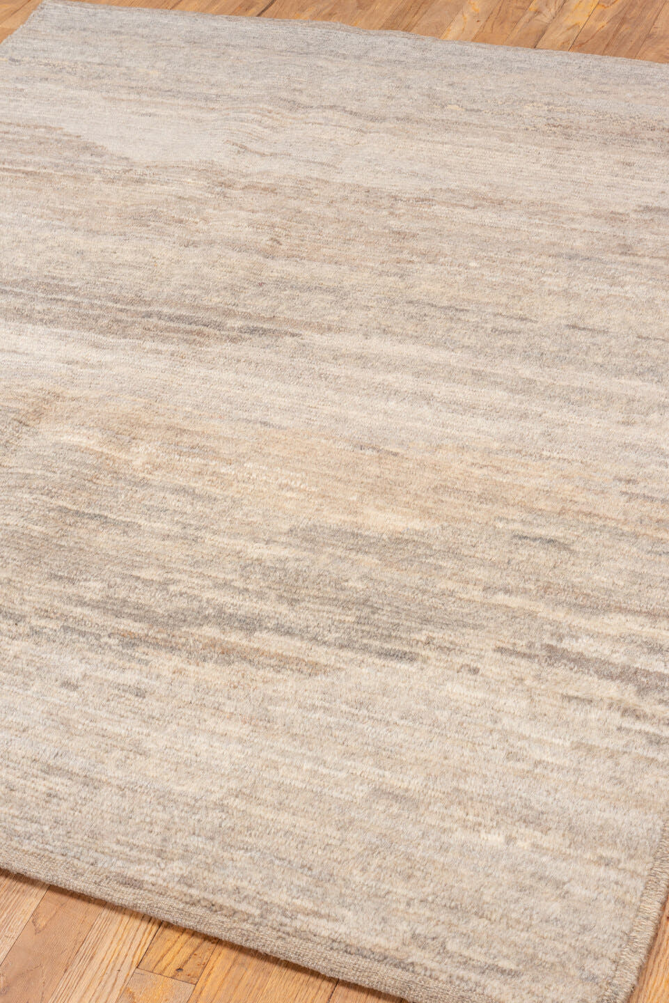 5' x 6' one-of-a-kind handmade vintage Tulu rug. Color palette: ivory, taupe, beige, gray, cream