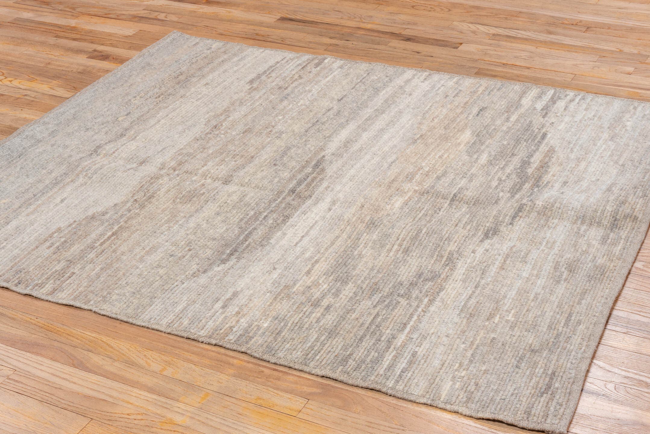 5' x 6' one-of-a-kind handmade vintage Tulu rug. Color palette: ivory, taupe, beige, gray, cream