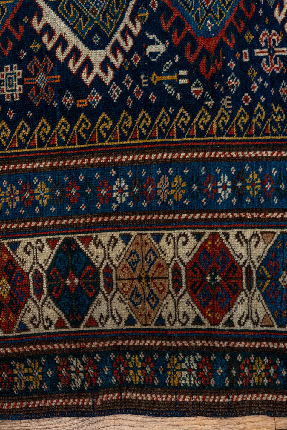3' x 5' one-of-a-kind handmade vintage Shirvan small size rug. Color palette: navy, ivory, cobalt, crimson, rust, camel