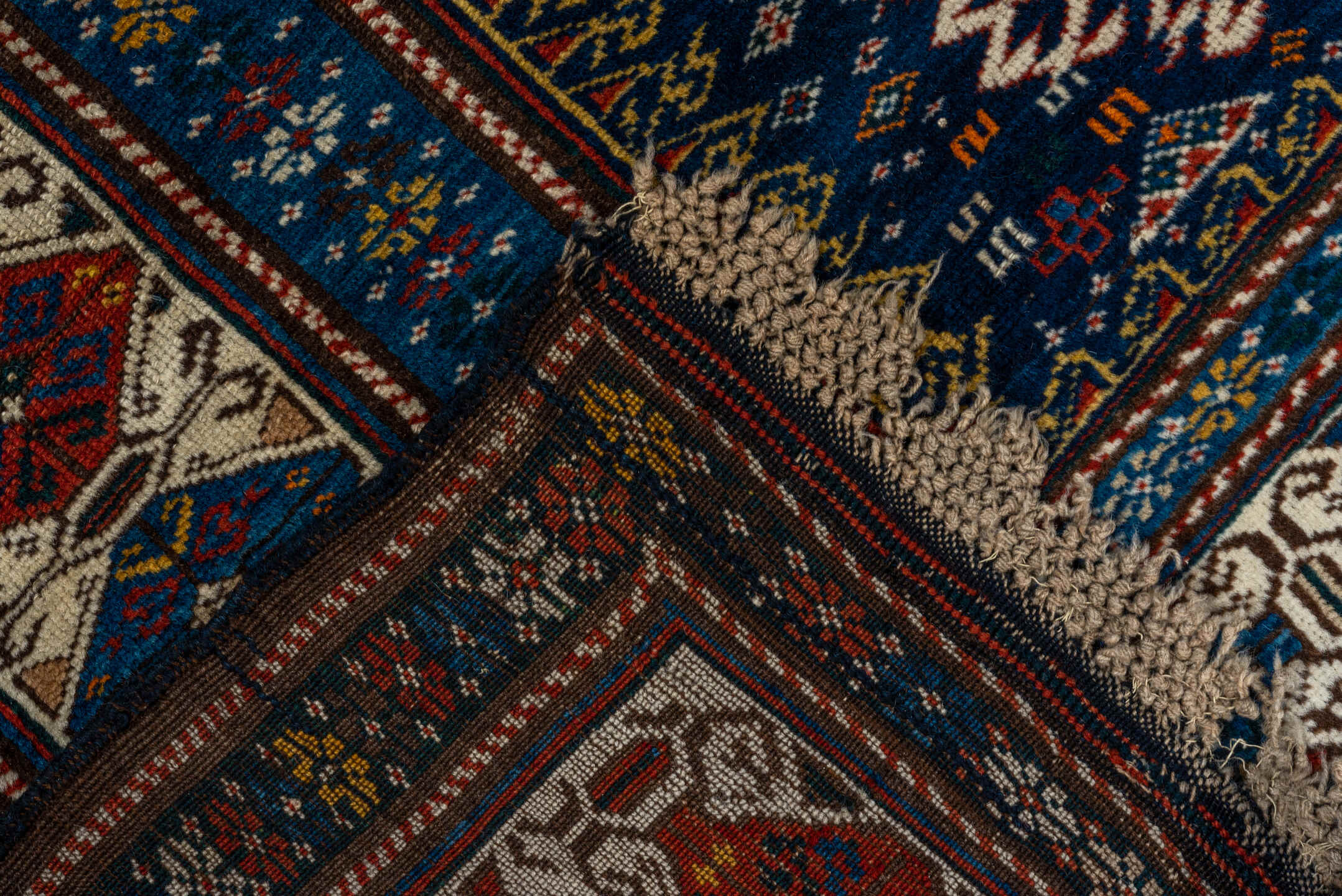 3' x 5' one-of-a-kind handmade vintage Shirvan small size rug. Color palette: navy, ivory, cobalt, crimson, rust, camel