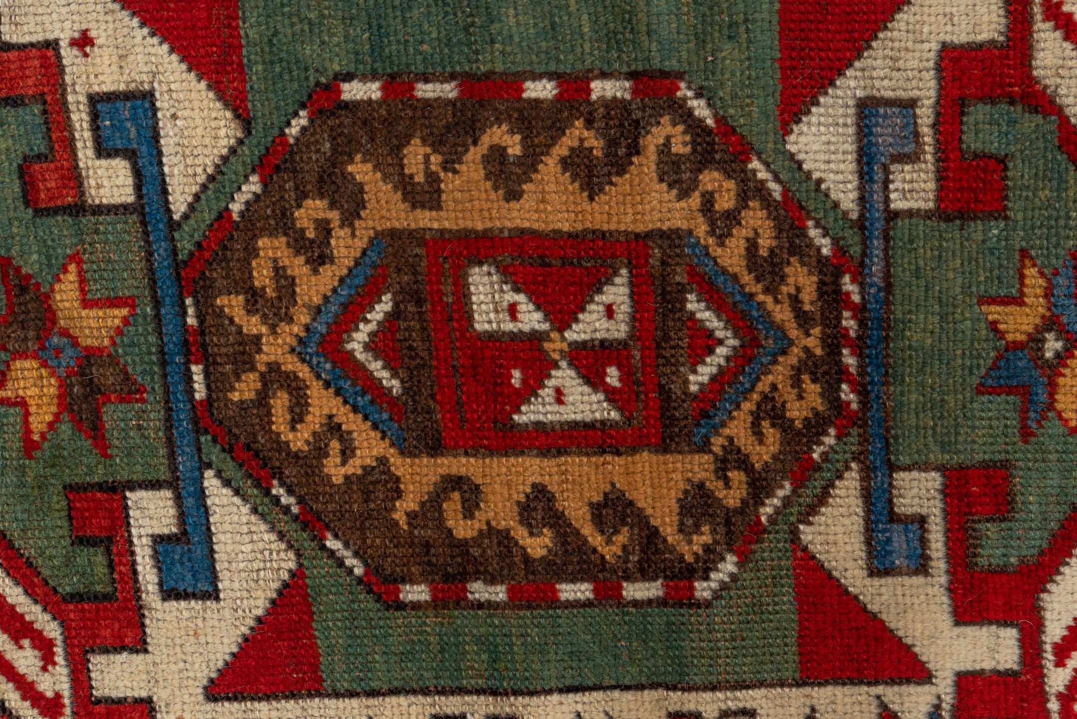 5' x 7' one-of-a-kind handmade vintage Kazak rug. Color palette: red, ivory, sky_blue, navy, brown, sage, camel, light blue