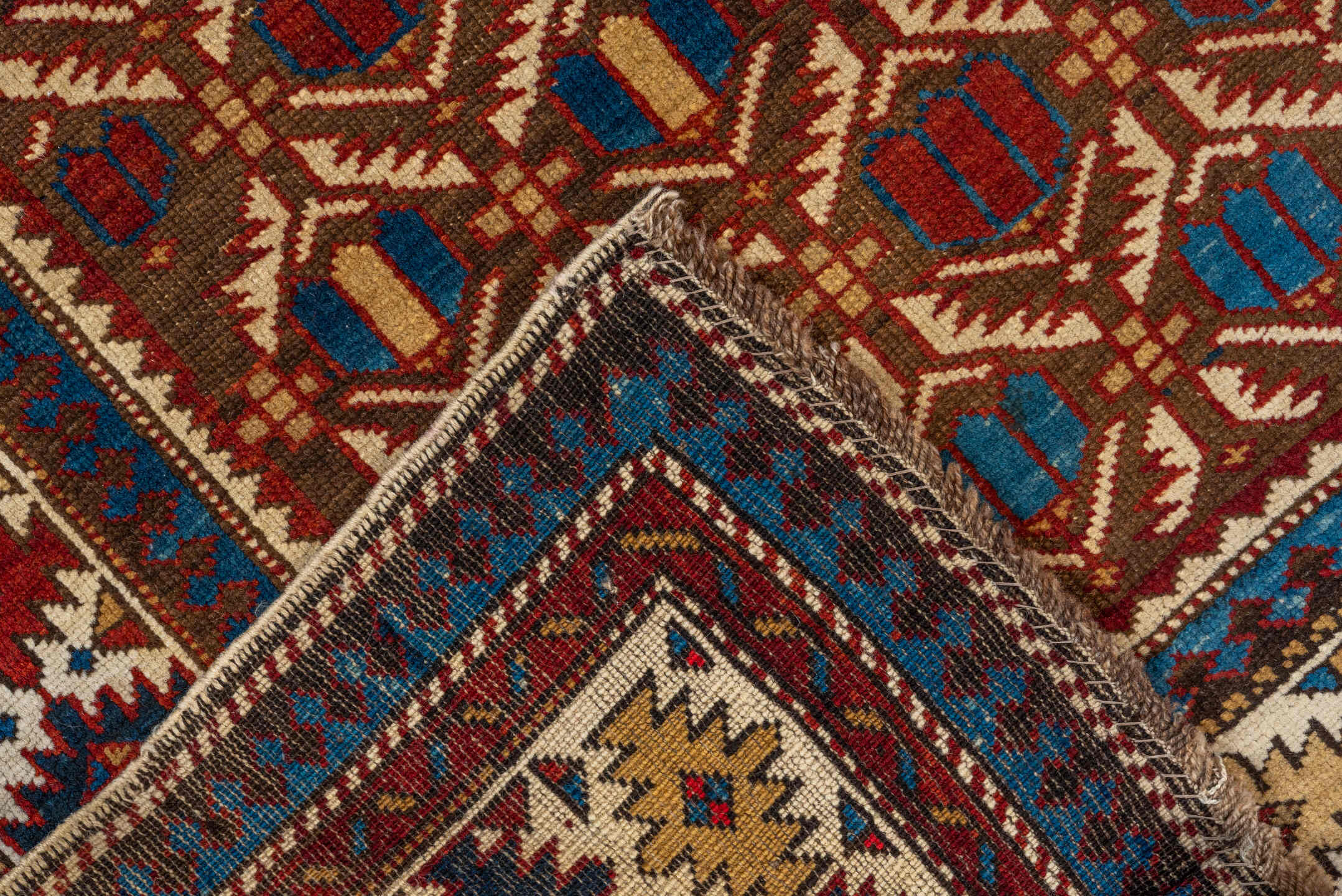 3' x 5' one-of-a-kind handmade vintage Shirvan small size rug. Color palette: blue, brown, dark gray, dark red, gray