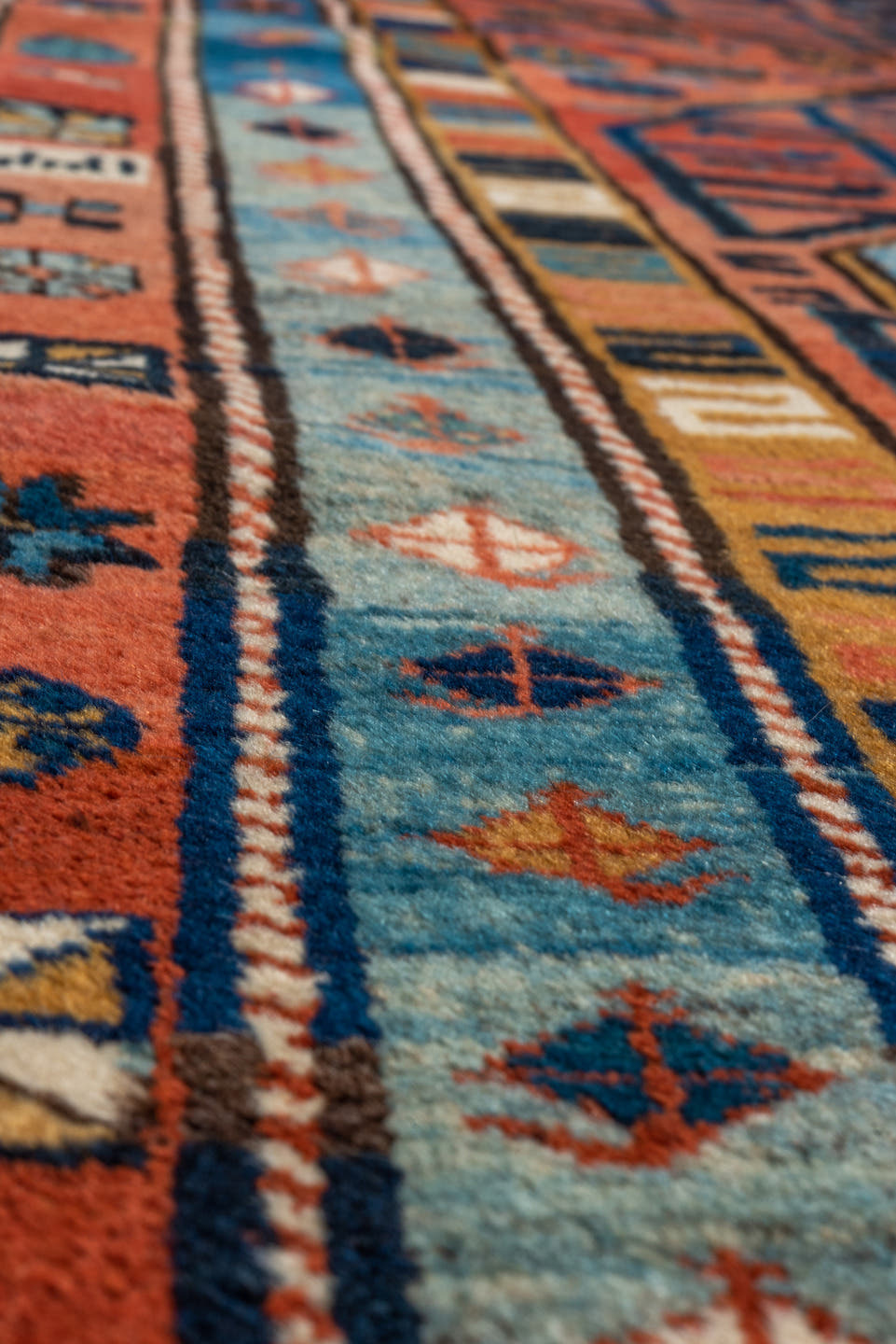 3' x 12' one-of-a-kind handmade vintage NW Persian runner rug. Color palette: rust, sky blue, navy, ivory, coral, camel