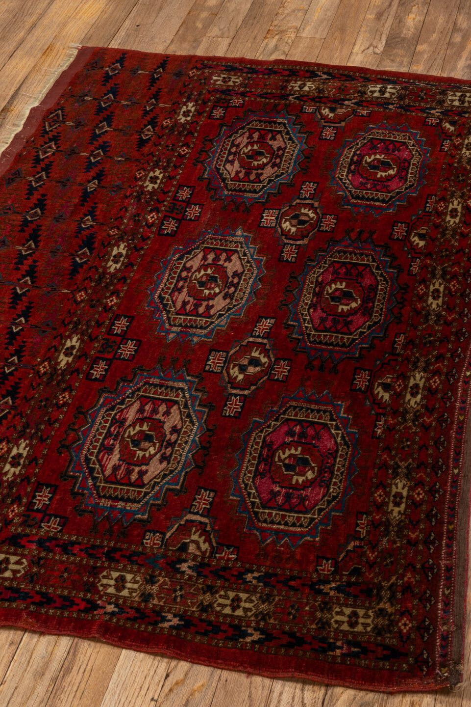 2' x 4' one-of-a-kind handmade vintage Teke small size rug. Color palette: red, burgundy, ivory, navy, rose, brown, black