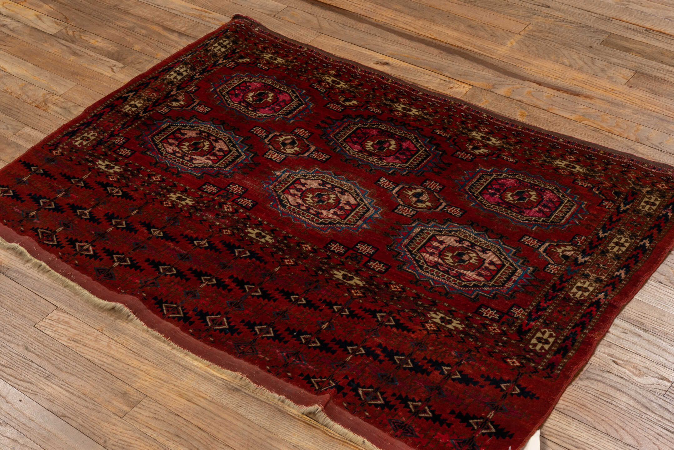 2' x 4' one-of-a-kind handmade vintage Teke small size rug. Color palette: blue, brown, burgundy, dark red, gray, maroon