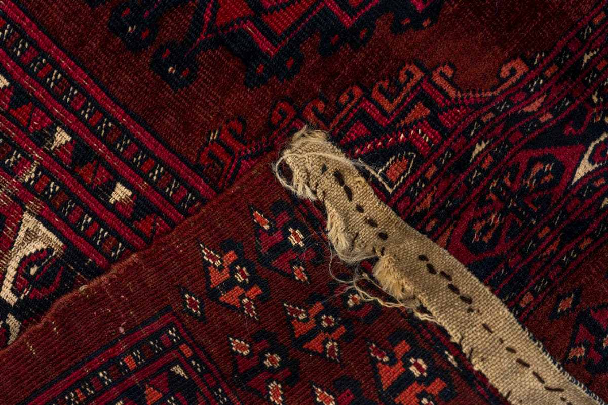 2' x 5' one-of-a-kind handmade vintage Teke small size rug. Color palette: burgundy, crimson, rust, ivory, charcoal, rose