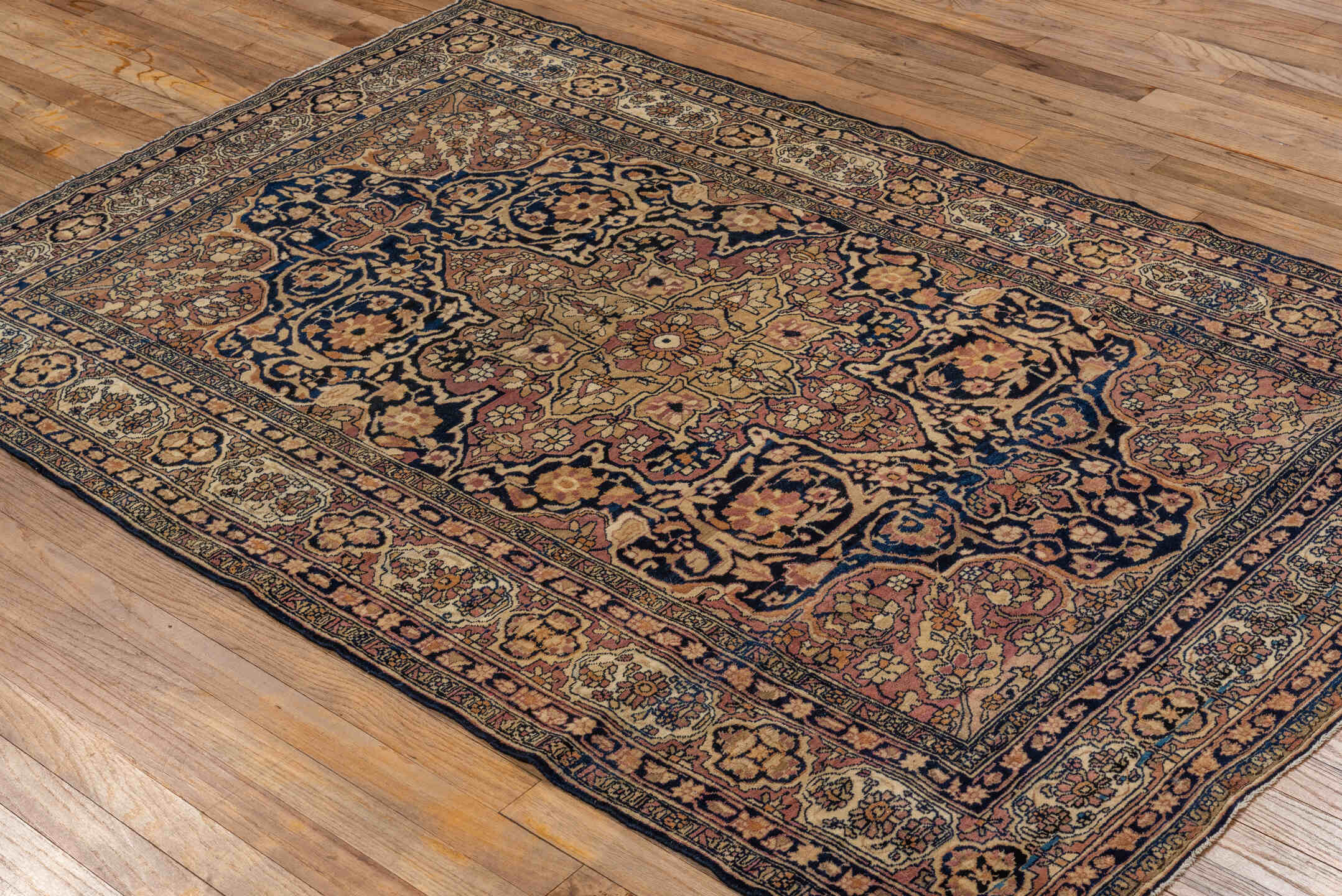 4' x 6' one-of-a-kind handmade vintage Lavar rug. Color palette: navy, ivory, rose, camel, gold, taupe, brown, blue, pink