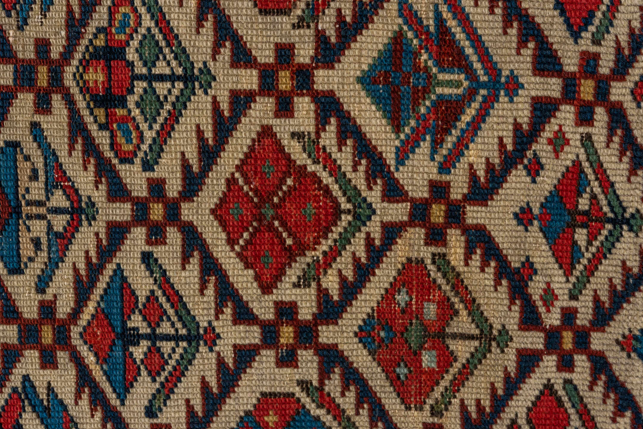 4' x 4' one-of-a-kind handmade vintage Shirvan small size rug. Color palette: ivory, navy, rust, sky blue, crimson, camel